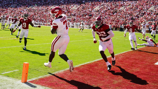 Oct 14, 2023; Tuscaloosa, Alabama, USA; Arkansas Razorbacks running back Rashod Dubinion (7) pulls down a touchdown pass against the Alabama Crimson Tide during the second half at Bryant-Denny Stadium.